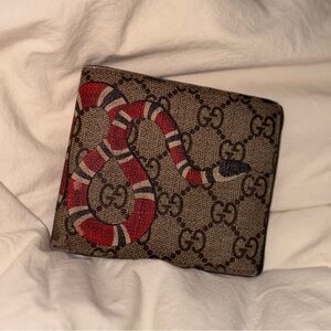 Gucci Snake GG Supreme Canvas Wallet with black leather trim bifold